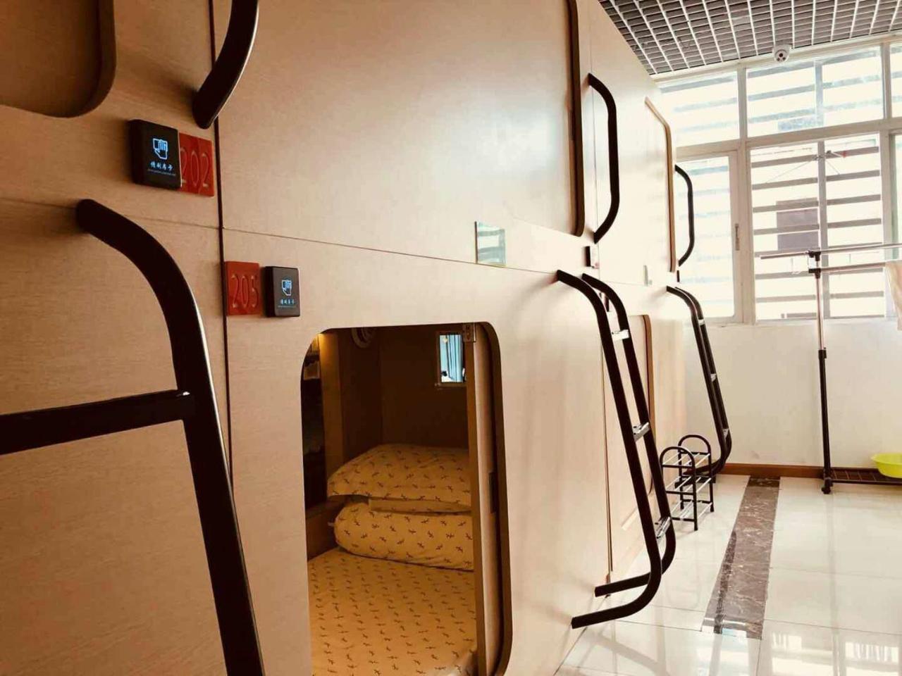 The Olive Tree Capsule Hostel Шънджън Екстериор снимка